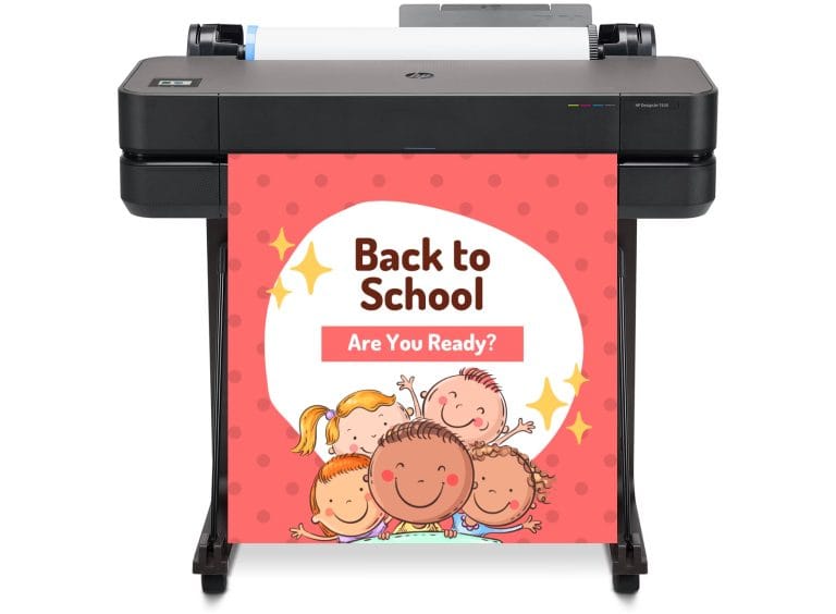Students creating and printing colorful posters using a wide-format poster machine in a school media center, with finished student-designed posters displayed on a nearby bulletin board.