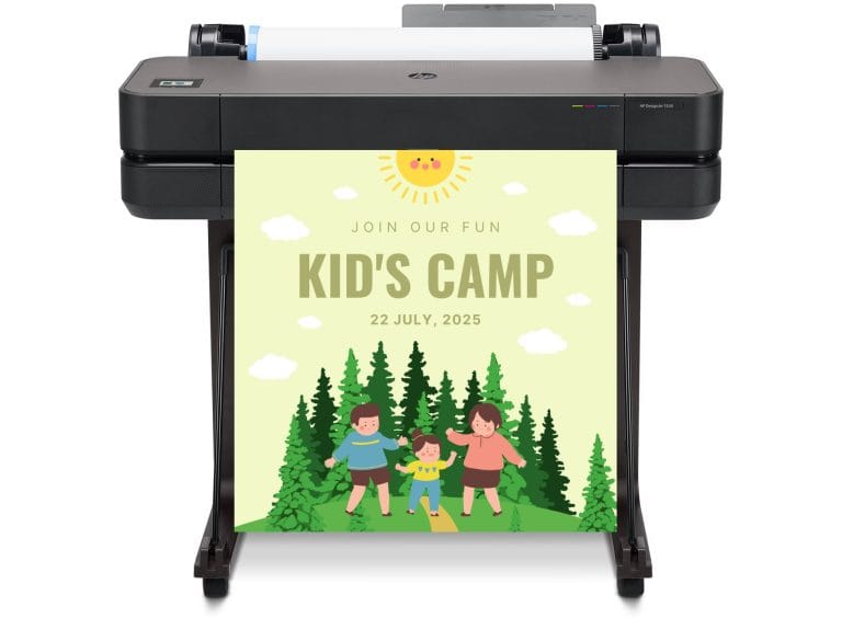 A teacher using a large-format poster printer to create a colorful anchor chart in a bright, modern classroom.