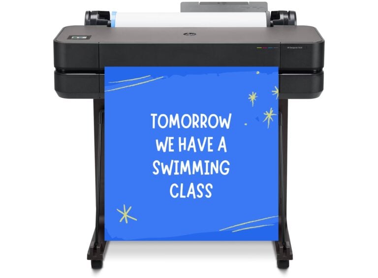 Educator operating a poster maker printer in a school setting, printing colorful classroom visuals and student-created designs for display.