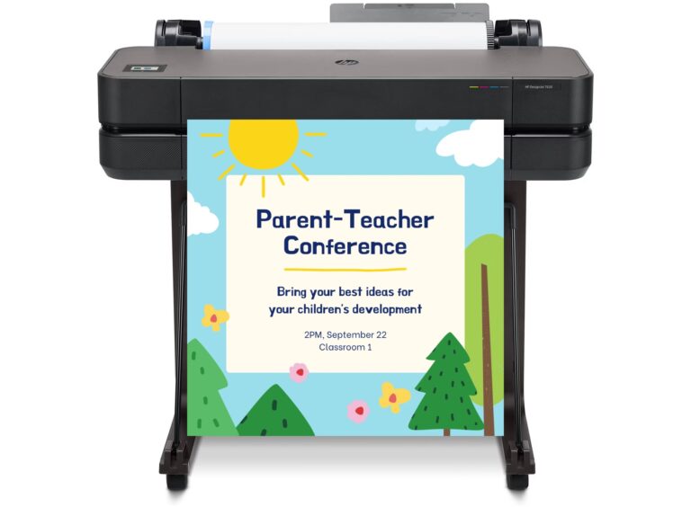 A teacher using a poster maker machine to print a large, colorful educational chart for a classroom bulletin board.