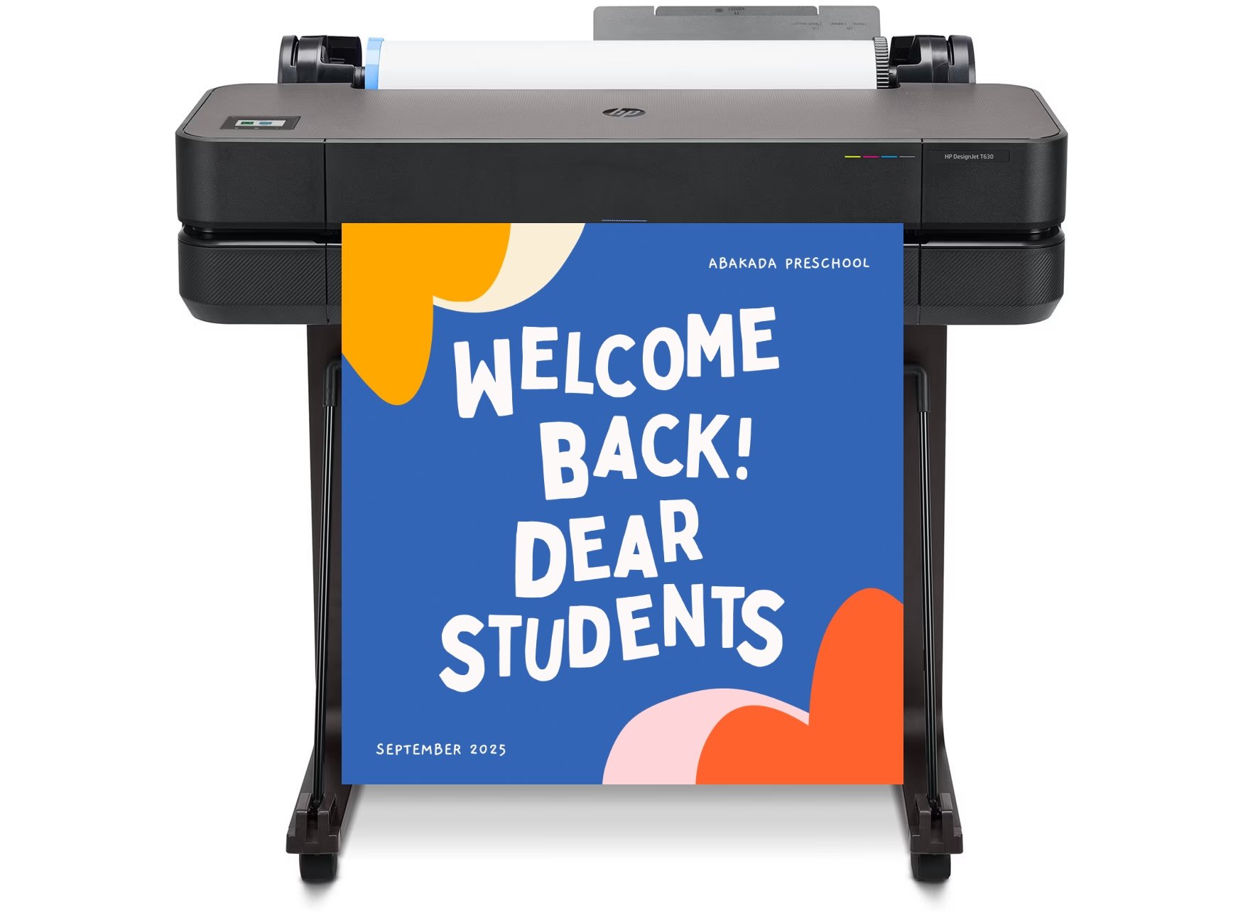 Teacher using a school poster making machine to print large colorful classroom posters for student learning and engagement