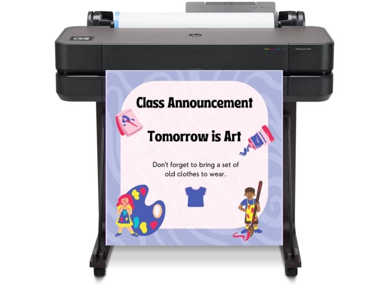 Teacher using a poster printing machine to create educational classroom visuals.