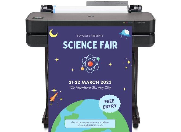 Teacher printing classroom visuals using a poster maker printer for education.