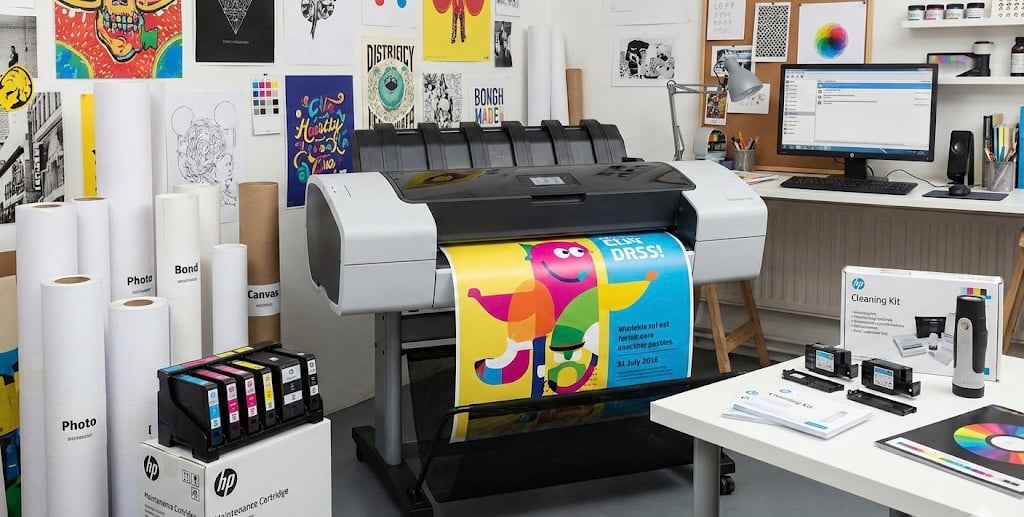 Wide-format poster paper rolls—matte, glossy, satin, and specialty media—used as essential poster printer supplies for professional printing. poster printer for schools